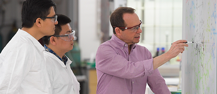 Professor Alan Goldman and chemistry students